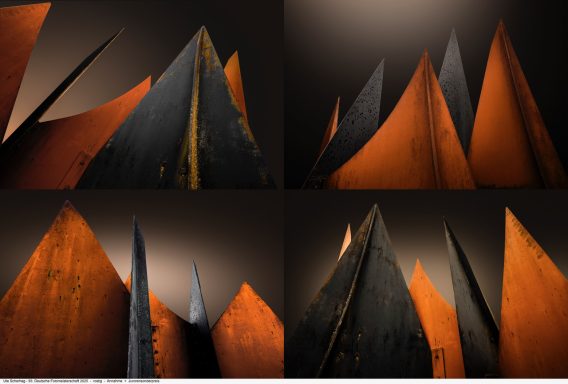 Abstrakte geometrische Formen in Schwarz und Orange, die an Berggipfel erinnern.